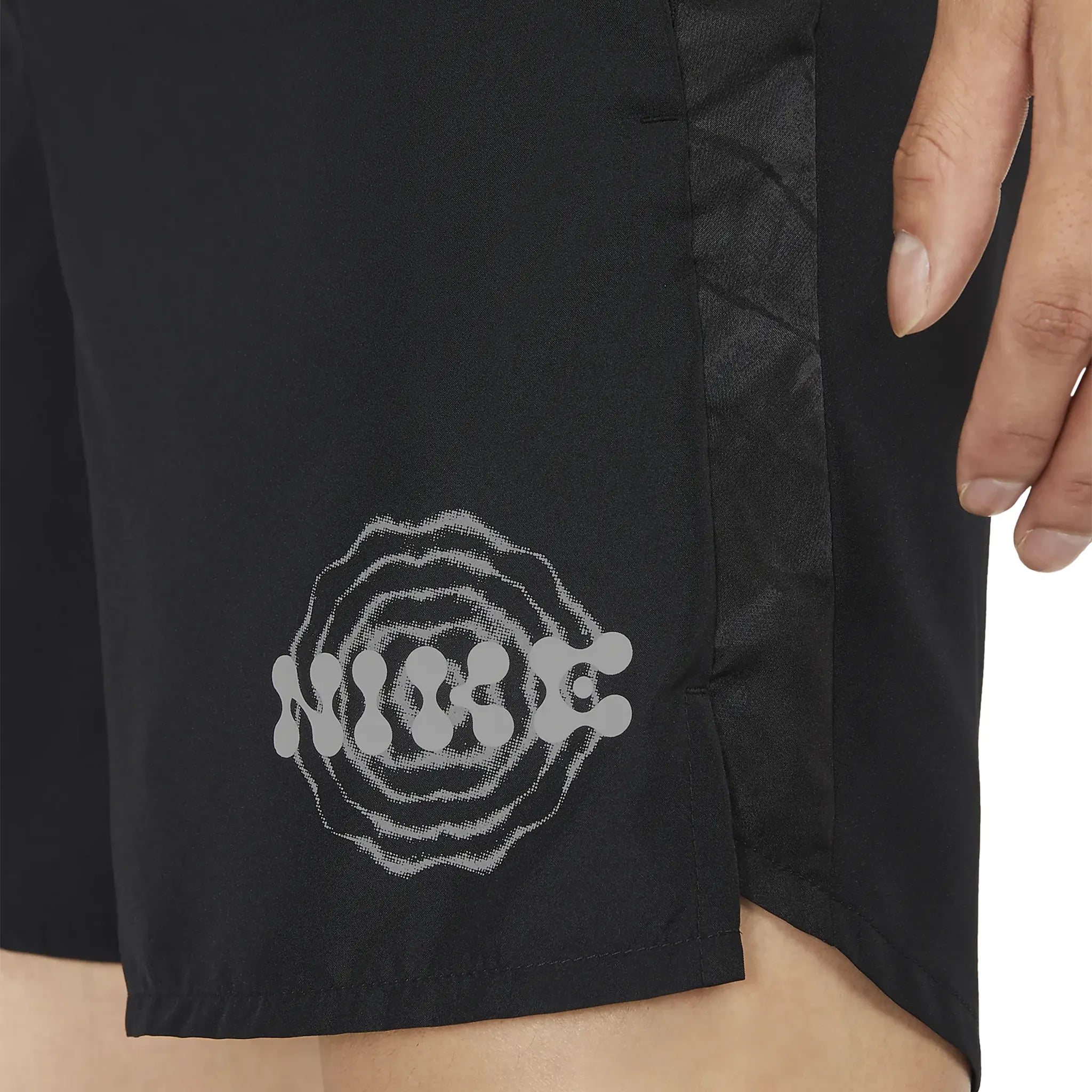 Logo Detail view of Nike Dri-Fit Wild Run Challenger DNA 7-Inch Black Running Shorts DM4820-010